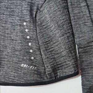 Nike DRY-FIT Women’s Charcoal Heather Quarter-Zip Top for running or jogging!